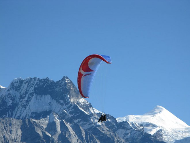 Flying above Bavarian Alps- paragliding tandem flights